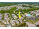 Aerial view showing neighborhood amenities of the green home including a pool and playground at 364 Springtime Fields Ln, Wake Forest, NC 27587