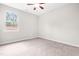 Neutral bedroom with carpeted floors, one window, and neutral paint at 364 Springtime Fields Ln, Wake Forest, NC 27587