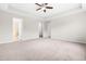 Bedroom features a ceiling fan, carpet, and natural light at 364 Springtime Fields Ln, Wake Forest, NC 27587