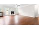Living room boasts hardwood floors, a fireplace, and access to the outdoors at 364 Springtime Fields Ln, Wake Forest, NC 27587
