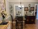 Cozy dining area with a round glass-top table and stylish decor at 405 Taylor Dr, Rocky Mount, NC 27803