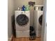 Convenient laundry room with modern washer and dryer units and ample storage space at 405 Taylor Dr, Rocky Mount, NC 27803