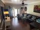 Stylish living room featuring hardwood floors, a large sofa, and elegant decor at 405 Taylor Dr, Rocky Mount, NC 27803