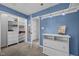 Bedroom view showcasing closet, dresser, and blue accent wall at 406 Bakewell Ct, Wake Forest, NC 27587