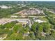 Expansive aerial shot showcasing the property's location near highway and surrounding landscape and city skyline at 424 Raleigh View Rd, Raleigh, NC 27610