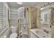 Bathroom featuring a glass door shower, vanity, and built-in storage cabinet at 424 Raleigh View Rd, Raleigh, NC 27610