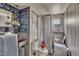 Bathroom featuring a shower, toilet, and sink area; in need of renovation at 424 Raleigh View Rd, Raleigh, NC 27610