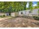 Exterior features a shed and mature trees surrounding the property, offering a private and serene setting at 424 Raleigh View Rd, Raleigh, NC 27610