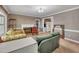 Comfortable living room featuring a fireplace, neutral walls, and cozy seating area, inviting relaxation and conversation at 424 Raleigh View Rd, Raleigh, NC 27610