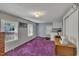 Versatile room with multiple windows, laundry appliances, and ample space at 424 Raleigh View Rd, Raleigh, NC 27610