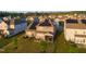Aerial view of a home featuring a yard, patio, and solar panels at 428 Parlier Dr, Apex, NC 27523
