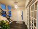 Inviting foyer featuring hardwood floors, a staircase, and a chandelier at 428 Parlier Dr, Apex, NC 27523