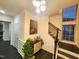 Entryway with a staircase, wooden floors, and decorative accents at 428 Parlier Dr, Apex, NC 27523