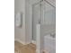 Clean bathroom featuring a glass shower enclosure and a built-in tub, perfect for relaxation at 4306 Brynwood Ave, Durham, NC 27713