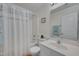 Classic bathroom featuring a shower-tub combo and a white vanity providing ample storage at 4306 Brynwood Ave, Durham, NC 27713