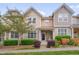 Inviting townhouse featuring well-maintained landscaping and a charming covered entrance at 4306 Brynwood Ave, Durham, NC 27713