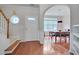 Foyer with hardwood floors and staircase leading to the upper level at 4306 Brynwood Ave, Durham, NC 27713