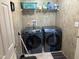 Practical laundry room with a washer and dryer for convenient in-home laundry at 4855 Mike Ln, Nashville, NC 27856