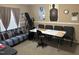 Office space with a workstation setup, comfortable seating, and natural light at 4855 Mike Ln, Nashville, NC 27856