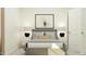 Serene bedroom with gray bed, matching nightstands, and a contemporary piece of artwork above the bed at 521 Morning Light Dr, Angier, NC 27501