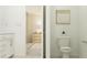 Clean bathroom with modern fixtures leads into a neutral toned bedroom, accessible through a doorway at 529 Morning Light Dr, Angier, NC 27501