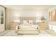 A bright bedroom features neutral tones, a patterned rug, and a cozy sitting bench at 529 Morning Light Dr, Angier, NC 27501