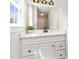 Bright bathroom vanity featuring granite countertop and matte black faucet at 5337 Nc Hwy 96, Selma, NC 27576