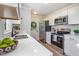 Modern kitchen features white cabinets, stainless steel appliances, and stylish countertops at 5337 Nc Hwy 96, Selma, NC 27576