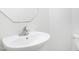 Close-up of a bathroom sink with a modern faucet and mirror at 5456 Grand Traverse Dr, Raleigh, NC 27604