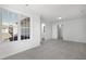 Bedroom showcasing natural light from large windows and neutral carpet and paint at 5456 Grand Traverse Dr, Raleigh, NC 27604