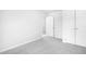 Bedroom features neutral walls and carpet and a closet at 5456 Grand Traverse Dr, Raleigh, NC 27604