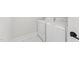 Dedicated laundry room with washer and dryer hookups and tile flooring at 620 Wexford Dr, Raleigh, NC 27603