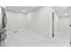 A bright room with fresh paint and floors, adjacent to another space with a doorway leading into it at 620 Wexford Dr, Raleigh, NC 27603