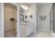Beautiful bathroom with double sinks, quartz counters, and a spacious walk-in closet at 63 W Victoria Ridge Dr # 31, Selma, NC 27576