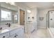 Elegant bathroom with double vanity, marble floors, and a glass-enclosed shower at 63 W Victoria Ridge Dr # 31, Selma, NC 27576