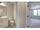 Bathroom view into bedroom showing tile floor and window with lots of natural light at 63 W Victoria Ridge Dr # 31, Selma, NC 27576