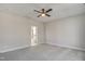 Cozy bedroom with ceiling fan and view of the ensuite bathroom at 63 W Victoria Ridge Dr # 31, Selma, NC 27576