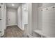 Entryway features a shiplap accent wall with hooks and a built-in bench at 63 W Victoria Ridge Dr # 31, Selma, NC 27576