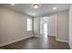 Bright and spacious living room featuring wood floors, neutral walls, and recessed lighting at 63 W Victoria Ridge Dr # 31, Selma, NC 27576