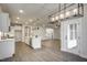 The modern open plan boasts a connected kitchen, dining, and living room at 63 W Victoria Ridge Dr # 31, Selma, NC 27576