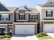 Charming townhome with a two-car garage and inviting curb appeal at 6341 Grace Lily Dr, Raleigh, NC 27607