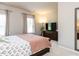 Tranquil main bedroom showcasing neutral tones, and a comfortable layout at 6341 Grace Lily Dr, Raleigh, NC 27607