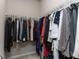Functional walk-in closet with ample storage space for clothing and accessories at 6341 Grace Lily Dr, Raleigh, NC 27607