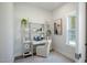 Bright office space with shelving, desk, and a large window offering natural light and a view of the outdoors at 680 Beacon Hill Rd # 52, Lillington, NC 27546