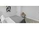 Bright bedroom with simple decor and a chair at 806 Martin Luther King Jr Dr, Smithfield, NC 27577