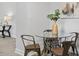Stylish dining area with glass table, seating for four, and modern decor at 806 Martin Luther King Jr Dr, Smithfield, NC 27577