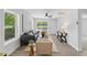 Comfortable living room with neutral tones and a view of the outdoors at 806 Martin Luther King Jr Dr, Smithfield, NC 27577
