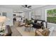 Bright and airy living room with modern furniture and large windows at 806 Martin Luther King Jr Dr, Smithfield, NC 27577