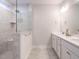 Bathroom with tiled shower and double vanity at 816 Still Willow Ln, Wendell, NC 27591