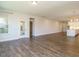 Open living area with hardwood floors and ample natural light throughout the space at 816 Still Willow Ln, Wendell, NC 27591
